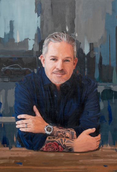 An oil painting by Oliver Winconek man with tattoos, wearing a dark shirt, sits with arms crossed, smiling confidently. 