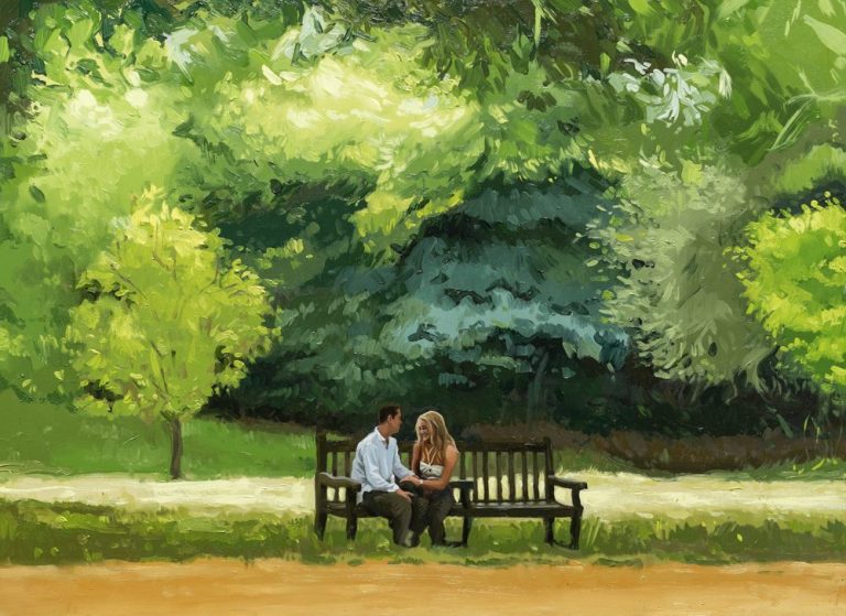 A couple sitting on a bench in a lush green park, surrounded by trees.
